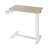 Garvee Mesa Auxiliar Ajustable para Cama Elevación Neumática y Ruedas Ocultas Escritorio Móvil con Portavasos Superficie de Madera Resistente Color Natural